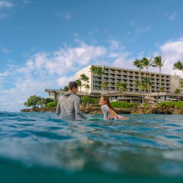 Surfers at the Point in the water